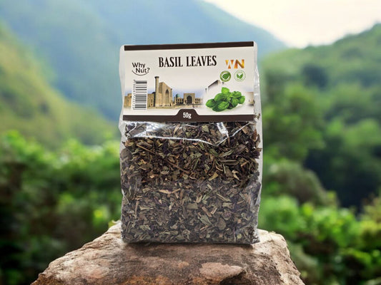 Dried basil leaves from Nature Pick Market, ideal for adding flavor to sauces, salads, and more, packed in a 50g bag labeled 'Basilika'.